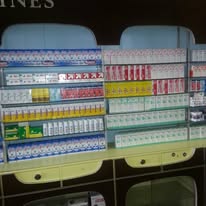 Well-stocked medicine shelves at Forestal Machipisa Pharmacy